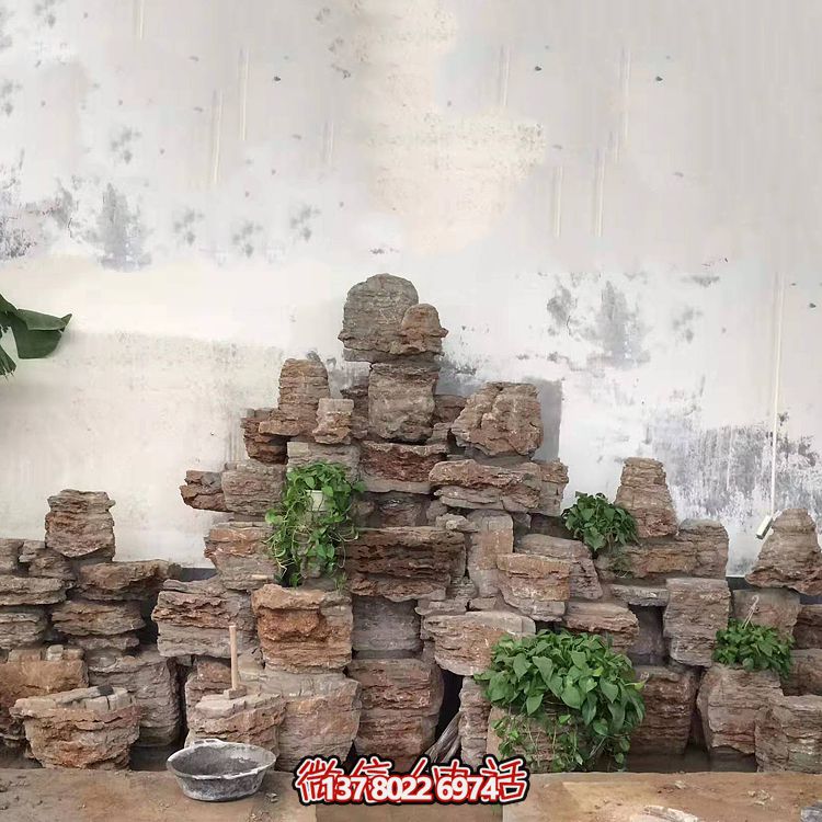 室內(nèi)景觀設(shè)計，精美石雕塑擺放奇石假山