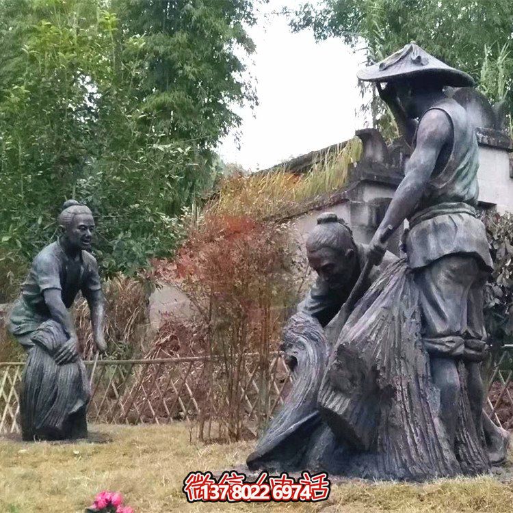 農(nóng)忙藝術家雕塑中的勞作人物