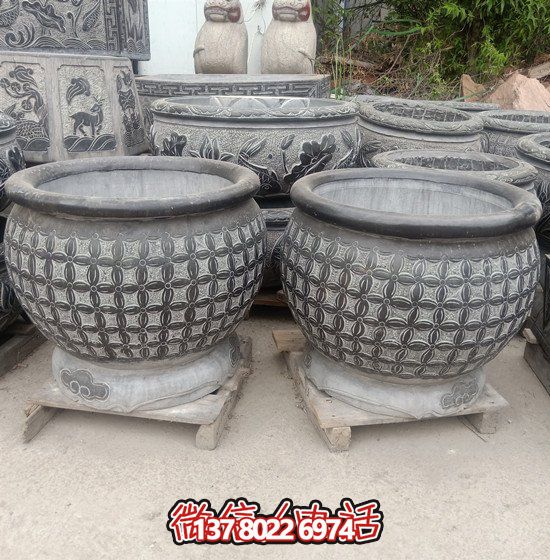 自然美學(xué)結(jié)合青石石雕、浮雕、編織、雕塑的戶外園林魚缸